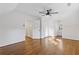 Bedroom featuring hardwood floors, an open doorway, and a modern ceiling fan at 1824 Westwood Sw Ave, Atlanta, GA 30310