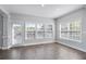 Bright dining area with multiple windows and a door to the outside, providing ample natural light at 4335 Hastings Dr, Cumming, GA 30041