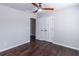 Bedroom featuring hard wood floors, ceiling fan, and standard closet at 965 Mulberry Bay Dr, Dacula, GA 30019