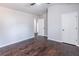 Bright bedroom with hardwood floors, vaulted ceiling and white doors at 965 Mulberry Bay Dr, Dacula, GA 30019