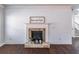 Living room features a stone fireplace, white shiplap wall, and dark hardwood floors at 965 Mulberry Bay Dr, Dacula, GA 30019