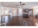 Expansive living space connects the kitchen and dining area, featuring hardwood floors at 965 Mulberry Bay Dr, Dacula, GA 30019