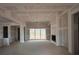Unfinished living area with a fireplace and lots of room at 157 Palisade Dr, Rydal, GA 30171