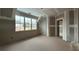Unfinished living space with a large window and natural light at 157 Palisade Dr, Rydal, GA 30171