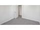 Spacious bedroom featuring carpet and a double door closet and bright white trim at 2777 Aralynn Way, College Park, GA 30337