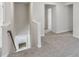 Upstairs hallway featuring carpet and neutral paint ready for customization at 2777 Aralynn Way, College Park, GA 30337