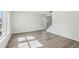 Spacious living area with hardwood floors and two windows providing natural light at 2777 Aralynn Way, College Park, GA 30337