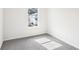 Bright bedroom with a large window and neutral carpet at 2778 Aralynn Way, College Park, GA 30337