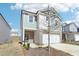 Charming two-story home featuring modern siding, a brick foundation, and a two-car garage at 2778 Aralynn Way, College Park, GA 30337