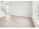 Bright living room with hardwood floors and staircase at 2778 Aralynn Way, College Park, GA 30337