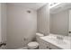 Small half bathroom with updated vanity, hardware, and fixtures, in neutral colors at 467 Pineburr Ln, Stone Mountain, GA 30087