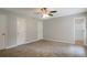 Spacious bedroom offering ample closet space, soft carpeting, and easy access to the bathroom at 467 Pineburr Ln, Stone Mountain, GA 30087