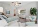 Bright bedroom featuring a chair with small table and neutral color scheme at 642 Stickley Oak Way, Woodstock, GA 30189