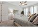 Bright bedroom featuring a chair with small table and neutral color scheme at 642 Stickley Oak Way, Woodstock, GA 30189