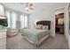 Bedroom with a walk-in closet and sitting area at 642 Stickley Oak Way, Woodstock, GA 30189