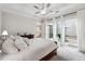 Main bedroom with access to a private patio through sliding glass doors at 642 Stickley Oak Way, Woodstock, GA 30189