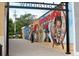 View of the Woodstock mural on a brick building at 642 Stickley Oak Way, Woodstock, GA 30189