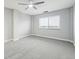 Cozy carpeted bedroom with ceiling fan, a bright window, and soothing neutral walls at 1501 Clairmont Rd # 1624, Decatur, GA 30033