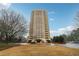 Modern high-rise building with balconies and manicured landscaping at 1501 Clairmont Rd # 1624, Decatur, GA 30033