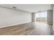 Inviting living room with wood-look floors and access to a private balcony at 1501 Clairmont Rd # 1624, Decatur, GA 30033