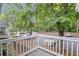 Balcony view overlooking parking area shaded with trees in condo community at 1905 Countryside Se Pl # 1905, Smyrna, GA 30080