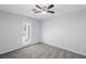 Bedroom with ceiling fan, carpet, and door to balcony at 1905 Countryside Se Pl # 1905, Smyrna, GA 30080