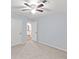 Carpeted bedroom with a ceiling fan and ensuite bath at 1905 Countryside Se Pl # 1905, Smyrna, GA 30080