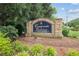 Stone sign for Countryside at Cumberland community surrounded by lush landscaping at 1905 Countryside Se Pl # 1905, Smyrna, GA 30080