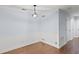 Bright dining room with modern light fixture, hardwood floors, and neutral paint at 1905 Countryside Se Pl # 1905, Smyrna, GA 30080