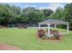 Community tennis court featuring a gazebo, seating, and beautiful landscaping at 1905 Countryside Se Pl # 1905, Smyrna, GA 30080