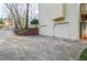 Side view of home showing attached garages and extended driveway at 1975 Skidmore Cir, Lawrenceville, GA 30044