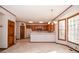 Eat-in kitchen featuring oak cabinets, and a view of the breakfast area at 1975 Skidmore Cir, Lawrenceville, GA 30044