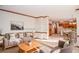 Bright living room with a view of the dining and kitchen areas at 1975 Skidmore Cir, Lawrenceville, GA 30044