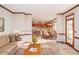 Open-concept living room seamlessly connects to the dining area and kitchen at 1975 Skidmore Cir, Lawrenceville, GA 30044