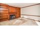 Cozy living room featuring a fireplace and bookshelves at 1975 Skidmore Cir, Lawrenceville, GA 30044