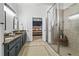 Bathroom features a glass shower and separate sink vanities at 2262 Ridgedale Ne Rd, Atlanta, GA 30317