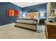 Comfortable bedroom features a large bed with blue walls at 2262 Ridgedale Ne Rd, Atlanta, GA 30317