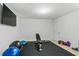 Bright and airy exercise room featuring modern equipment and a flat-screen TV for a complete workout experience at 2262 Ridgedale Ne Rd, Atlanta, GA 30317