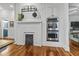 The kitchen includes stainless steel double ovens built in next to the decorative fireplace at 2262 Ridgedale Ne Rd, Atlanta, GA 30317