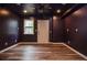 Cozy bedroom with a ceiling fan, window, and white door, showcasing the home's comfortable interior at 970 Winding Creek Trl, Atlanta, GA 30328