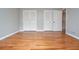 Bright bedroom with hardwood floors, and closet space at 970 Winding Creek Trl, Atlanta, GA 30328