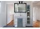 This bathroom features an integrated sink, a large mirror and shelf space at 412 E Pharr Rd, Decatur, GA 30030