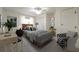 Bedroom offers bright natural light, desk, chair, sitting chair and neutral walls at 412 E Pharr Rd, Decatur, GA 30030