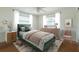Cozy bedroom with natural light, stylish decor, and neutral walls, creating a comfortable space at 412 E Pharr Rd, Decatur, GA 30030