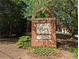 Stone entrance sign with brick accents and flowerbed near the entryway at 412 E Pharr Rd, Decatur, GA 30030