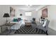 Living room area with neutral color walls, carpet and bright natural light at 412 E Pharr Rd, Decatur, GA 30030