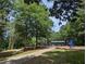 Scenic playground located in a wooded area with paved trail at 412 E Pharr Rd, Decatur, GA 30030