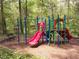 Colorful community playground with slides, climbing structures, and a bench for relaxing at 412 E Pharr Rd, Decatur, GA 30030
