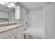 Bathroom featuring a bathtub, tiled shower, vanity with granite countertop, and a mirror at 120 Arrowood Ln, Alpharetta, GA 30009