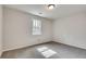 Light filled bedroom with soft carpet and a bright window at 120 Arrowood Ln, Alpharetta, GA 30009